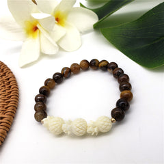 Hawaiian Bracelets In Different Colors With Golden And Ivory Color Beads