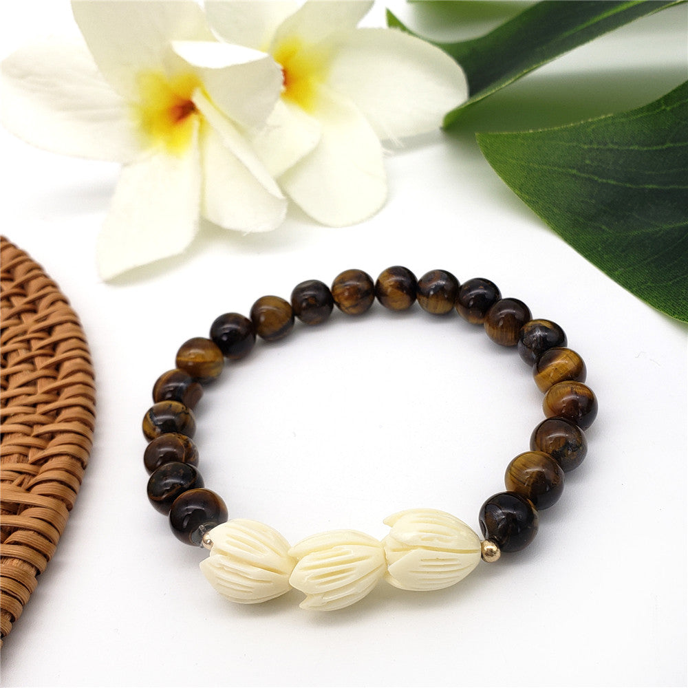 Hawaiian Bracelets In Different Colors With Golden And Ivory Color Beads