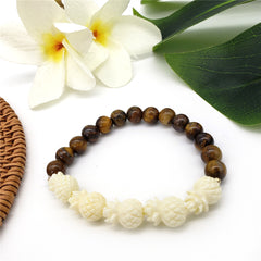 Hawaiian Bracelets In Different Colors With Golden And Ivory Color Beads