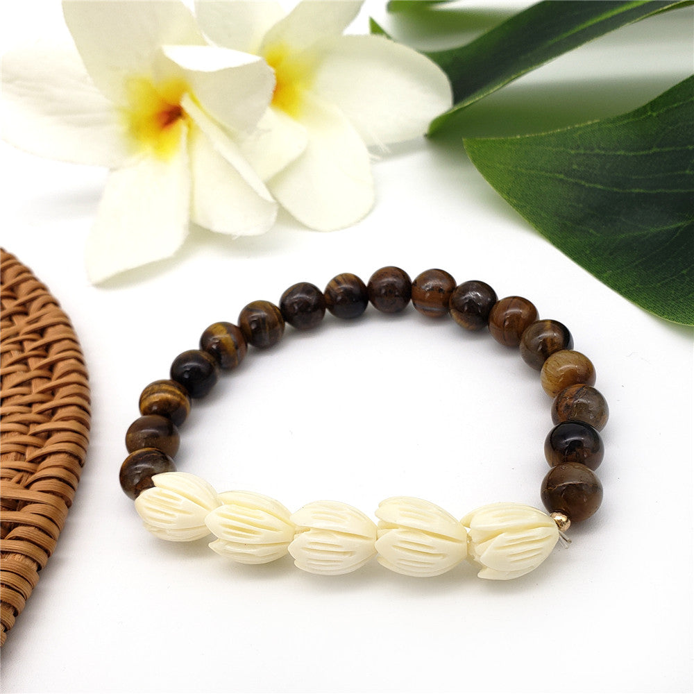 Hawaiian Bracelets In Different Colors With Golden And Ivory Color Beads