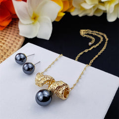 Set Of Carved Twisted Roll Necklace With A Pearl And Pearl Stud Earrings In Different Colors