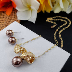 Set Of Carved Twisted Roll Necklace With A Pearl And Pearl Stud Earrings In Different Colors