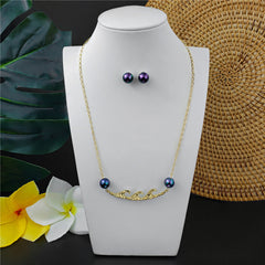 Set Of Pearl Stud Earrings And Carved Ocean Waves Necklace With Pearls In Different Colors