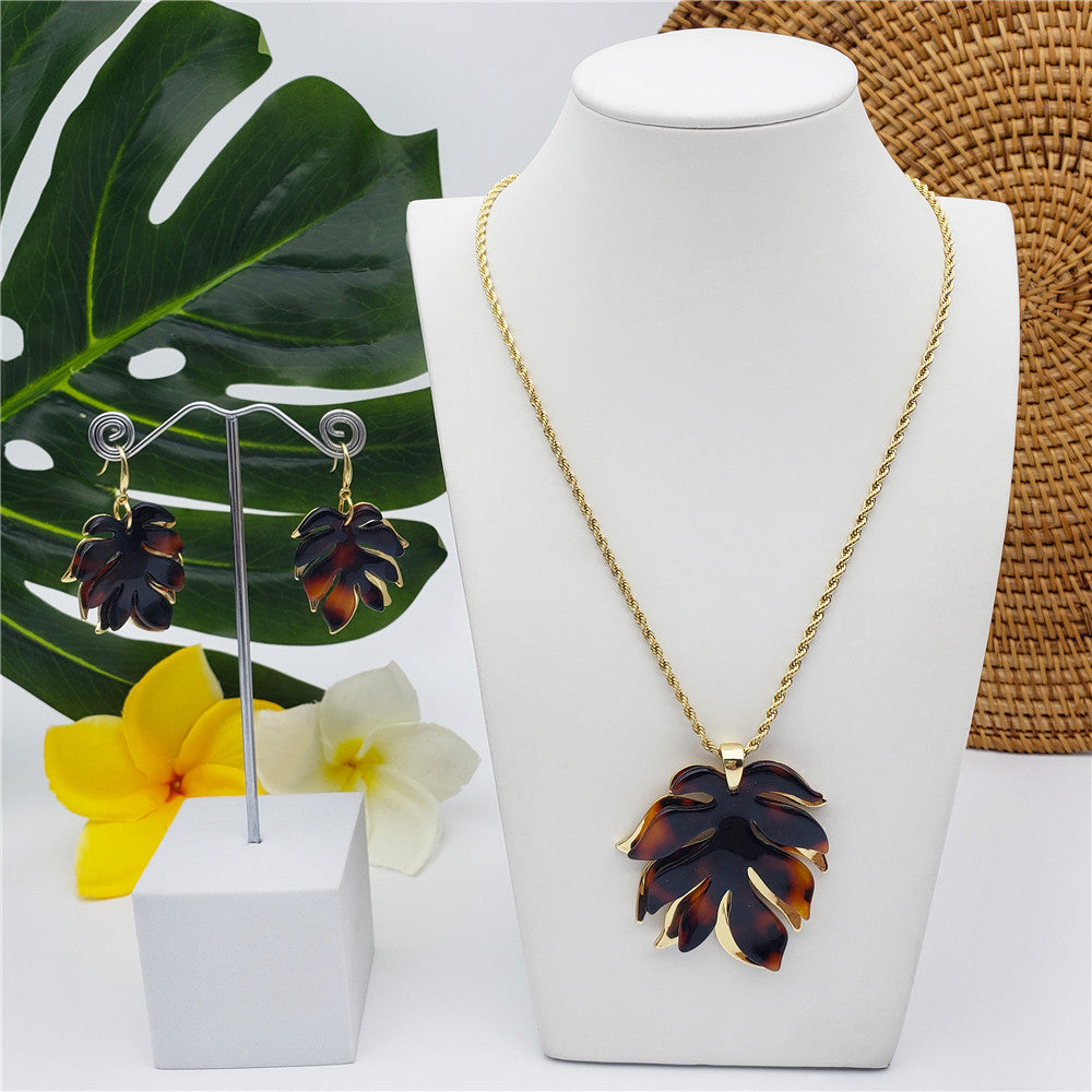 Set Of Tortoise Shell Earrings And Necklace In Different Styles