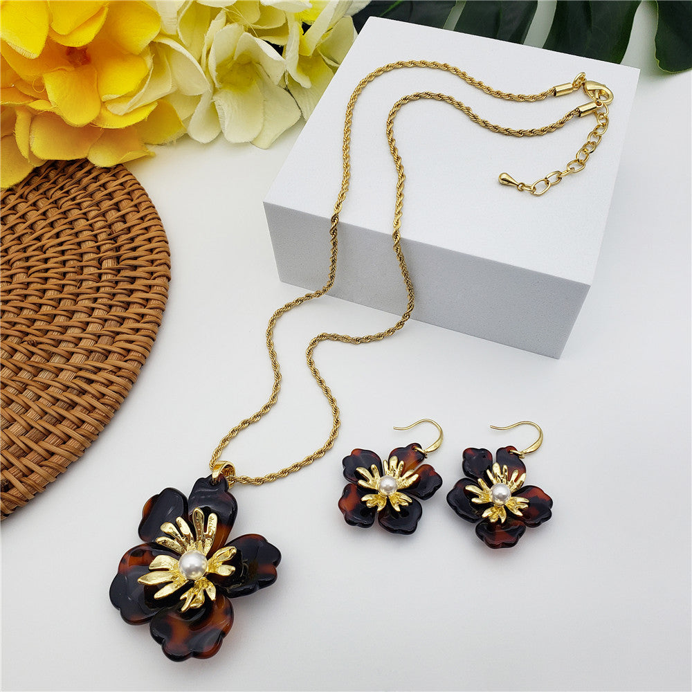 Set Of Tortoise Shell Earrings And Necklace In Different Styles