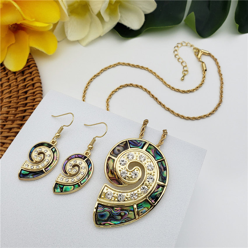 Set Of Swirl Earrings And Necklace With Metallic Green-Purple And White Zircons