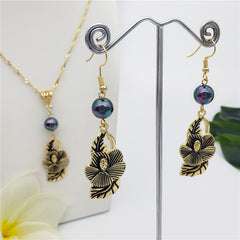 Set Of Hawaiian Carved Hibiscus Flower And Leaves Earrings And Necklace Sustained With A Pearl In Different Colors