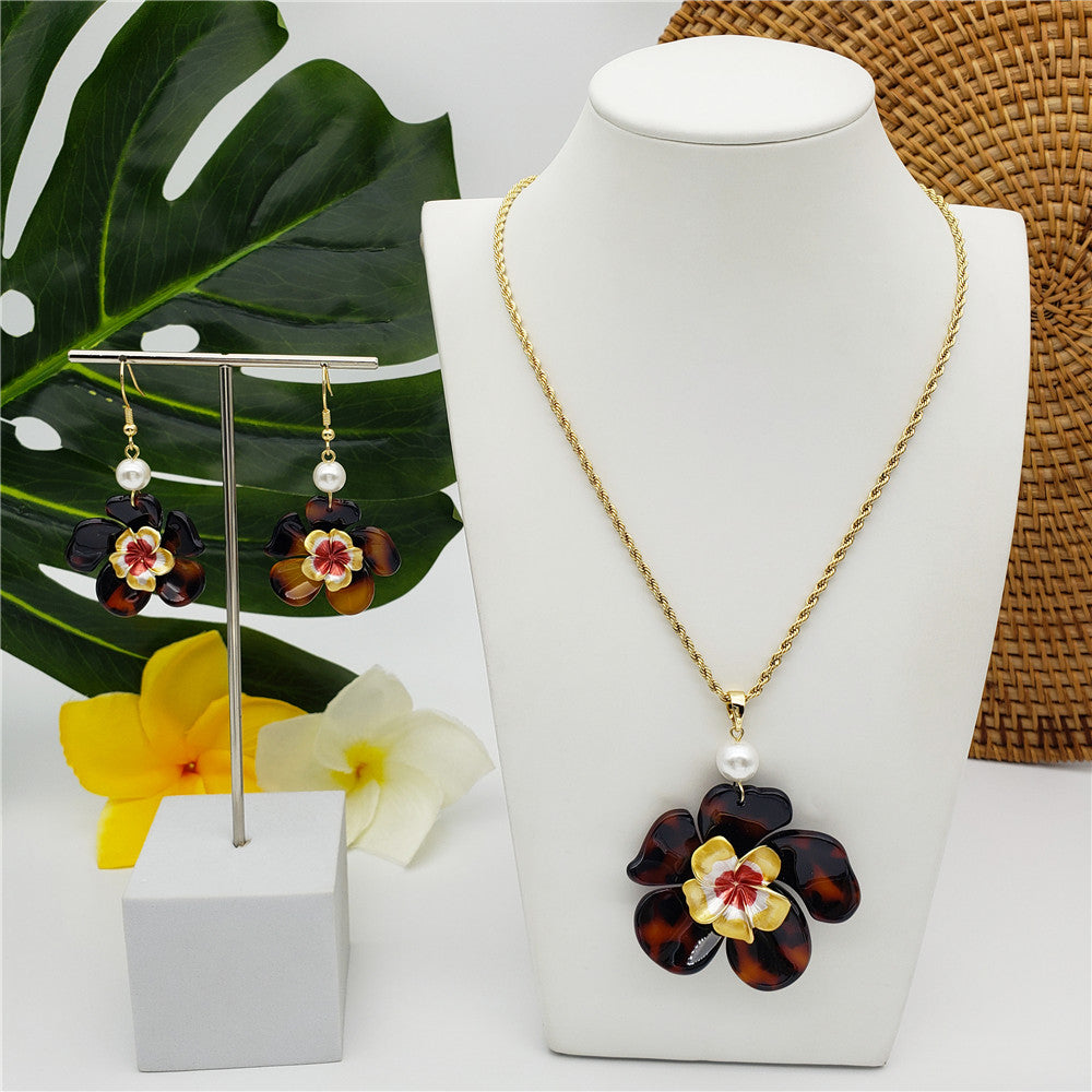 Set Of Tortoise Shell Earrings And Necklace In Different Styles