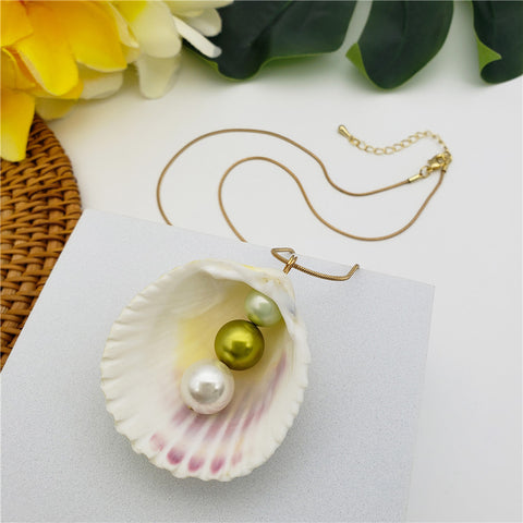 Hawaiian Seashell Necklace With Double Light Silver And Single Peridot Pearls