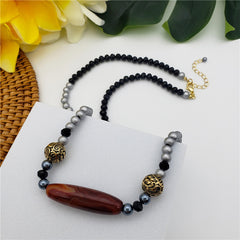 Silver Pearl & Black Gemstone Necklace With Brown Jade Bar And Carved Golden Beads