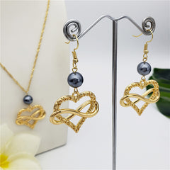 Set Of Infinity Carved Heart Earrings And Necklace Sustained With A Pearl In Different Colors