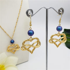 Set Of Infinity Carved Heart Earrings And Necklace Sustained With A Pearl In Different Colors