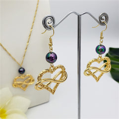 Set Of Infinity Carved Heart Earrings And Necklace Sustained With A Pearl In Different Colors