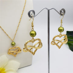 Set Of Infinity Carved Heart Earrings And Necklace Sustained With A Pearl In Different Colors