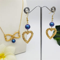 Set Of Carved Heart Earrings And Carved Heart Infinity Necklace Sustained With A Pearl In Different Colors