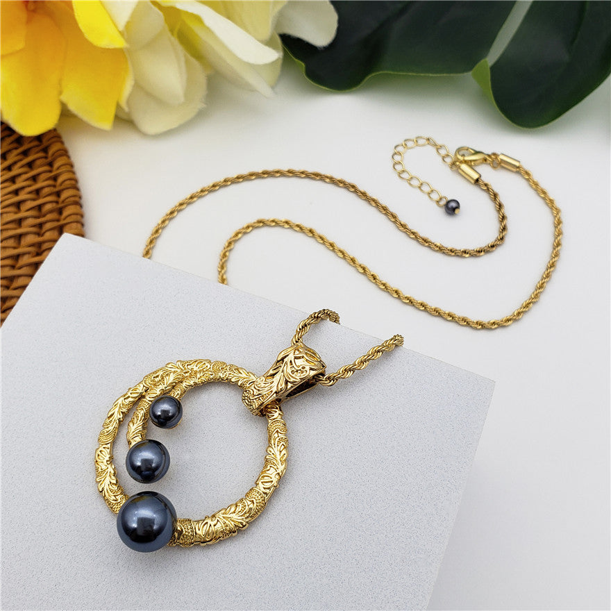 Set Of Petrol Pearl Stud Earrings And Carved Circle With Petrol Pearls Necklace In Silver/Gold