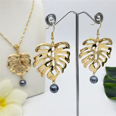 Set Of Hawaiian Monstera Leaf Earrings And Necklace Sustained With A Pearl From The Bottom In Different Colors