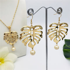 Set Of Hawaiian Monstera Leaf Earrings And Necklace Sustained With A Pearl From The Bottom In Different Colors