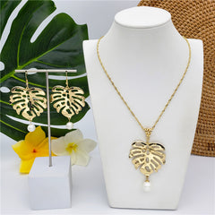 Set Of Hawaiian Monstera Leaf Earrings And Necklace Sustained With A Pearl From The Bottom In Different Colors