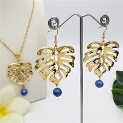 Set Of Hawaiian Monstera Leaf Earrings And Necklace Sustained With A Pearl From The Bottom In Different Colors