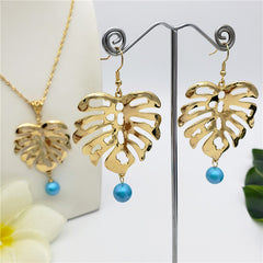 Set Of Hawaiian Monstera Leaf Earrings And Necklace Sustained With A Pearl From The Bottom In Different Colors