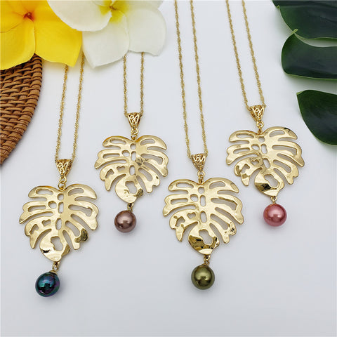 Set Of Hawaiian Monstera Leaf Earrings And Necklace Sustained With A Pearl From The Bottom In Different Colors