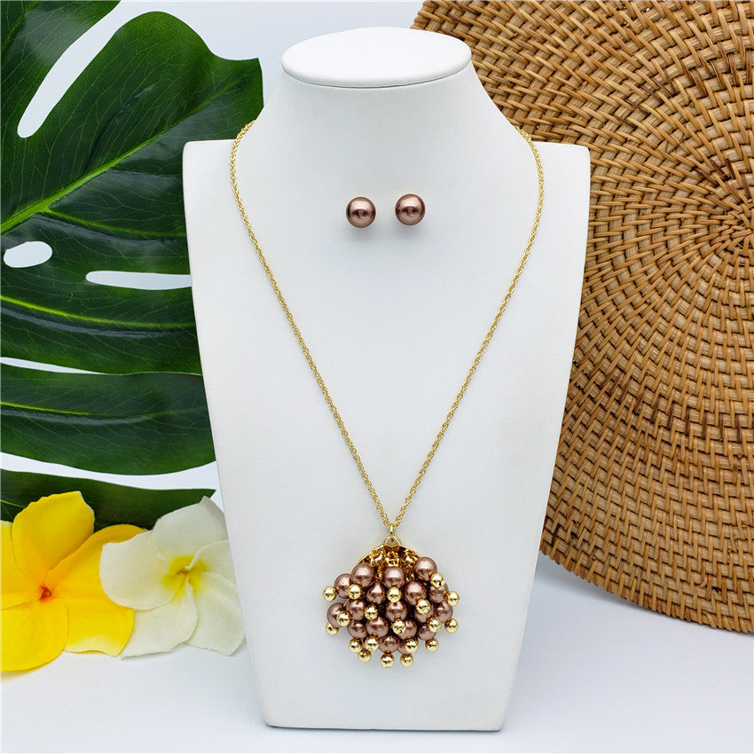 Set Of Pearl Stud Earrings And Pom Pom Necklace With Golden Beads And Pearls In Different Colors