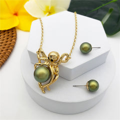 Set Of Pearl Stud Earrings And Octopus Necklace Holding A Pearl In Different Colors