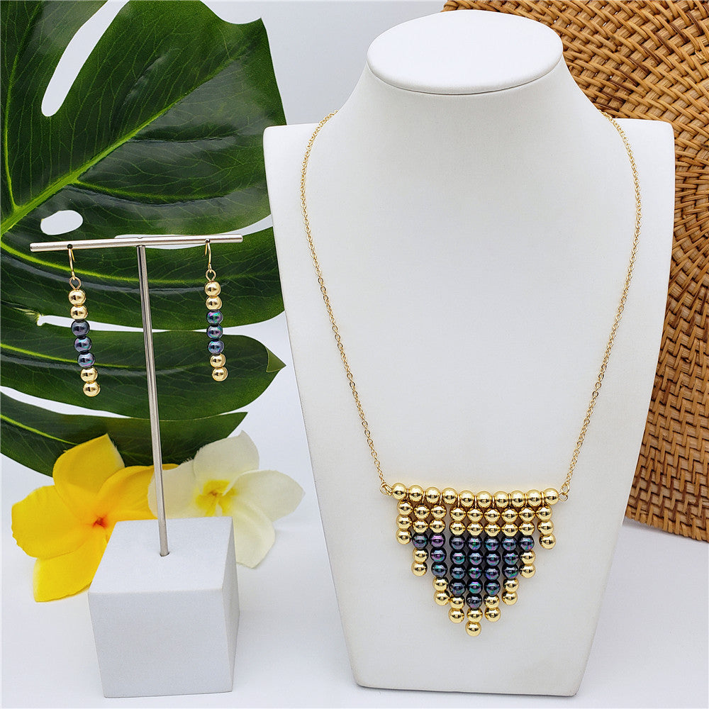 Set Of Hawaiian Earrings And Necklace With Golden Beads Centered With Beads In Different Colors