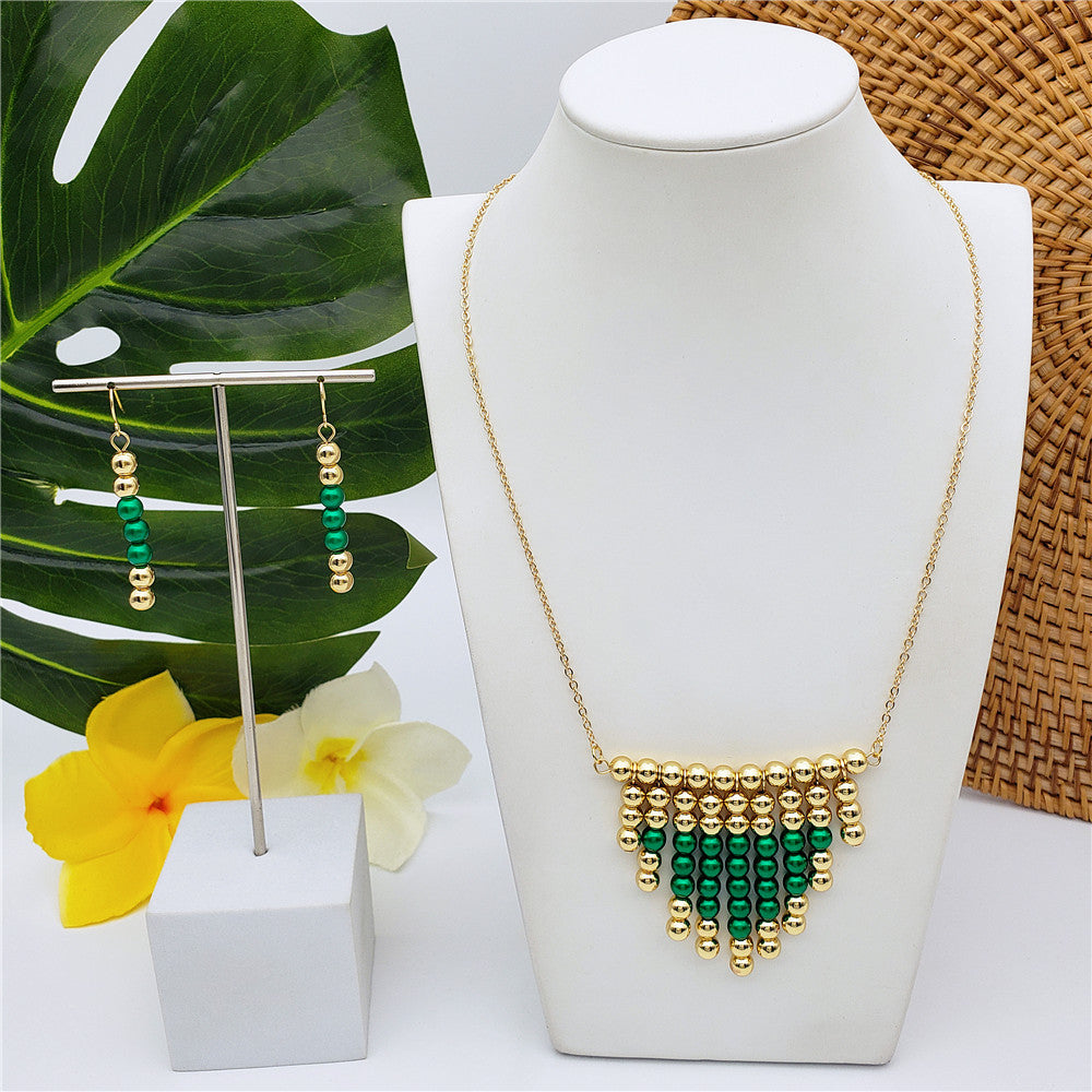 Set Of Hawaiian Earrings And Necklace With Golden Beads Centered With Beads In Different Colors