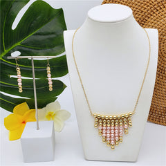 Set Of Hawaiian Earrings And Necklace With Golden Beads Centered With Beads In Different Colors