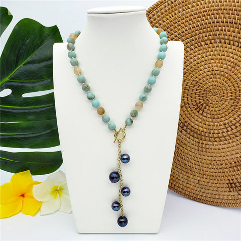 Aquamarine Gemstone Necklace With T-Bar And Toggle Sustained With A Chain Of Metallic Green-Purple Pearls