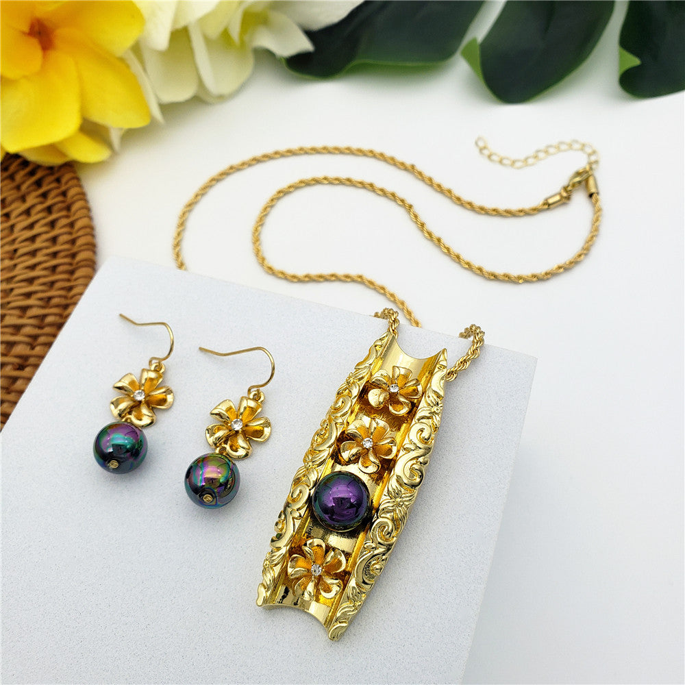 Set Of Plumeria Flowers With White Zircons And Metallic Green-Purple Pearl Earrings And Carved Tunnel Of Flowers And Pearl Necklace