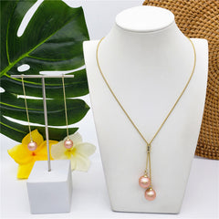 Set Of Chain Drop Earrings And Necklace Sustained With A Pearl In Different Colors