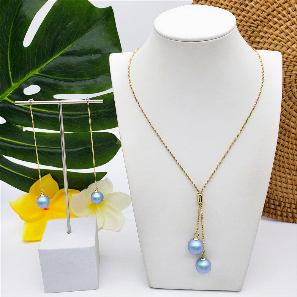 Set Of Chain Drop Earrings And Necklace Sustained With A Pearl In Different Colors