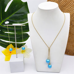 Set Of Chain Drop Earrings And Necklace Sustained With A Pearl In Different Colors