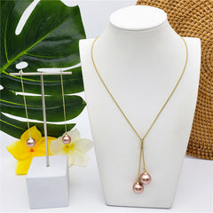 Set Of Chain Drop Earrings And Necklace Sustained With A Pearl In Different Colors