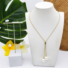 Set Of Chain Drop Earrings And Necklace Sustained With A Pearl In Different Colors