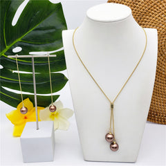 Set Of Chain Drop Earrings And Necklace Sustained With A Pearl In Different Colors