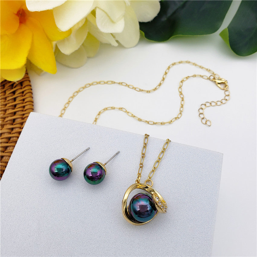 Set Of Metallic Green-Purple Pearl Stud Earrings And Eye Of The Universe Necklace With Metallic Green-Purple Pearl In Different Styles