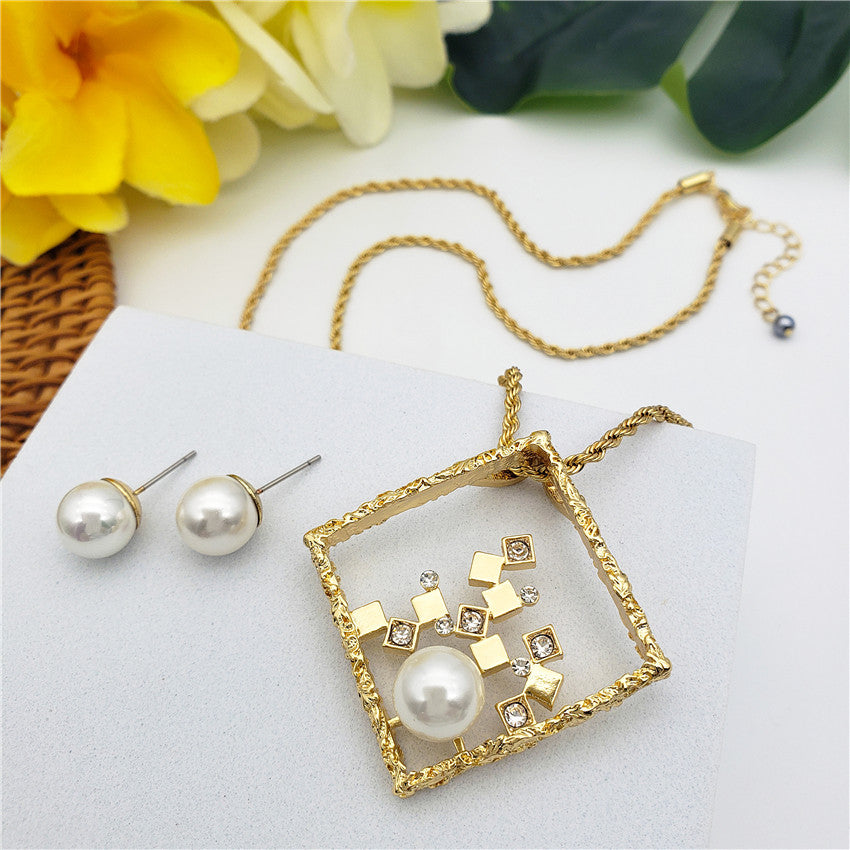 Set Of Pearl Stud Earrings And Square Necklace With Cubes, White Zircons And A Pearl In Different Colors