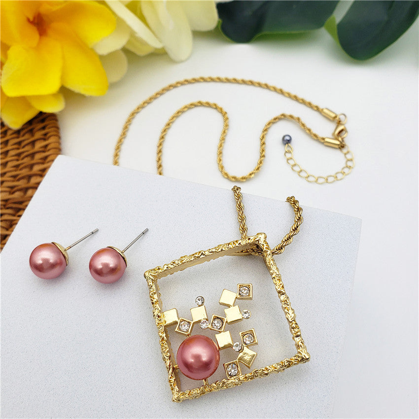 Set Of Pearl Stud Earrings And Square Necklace With Cubes, White Zircons And A Pearl In Different Colors