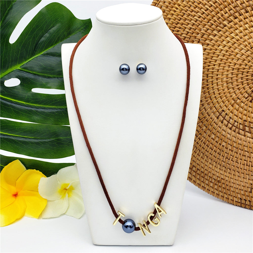 Set Of Petrol Pearl Stud Earrings And Leather Necklace In Different Colors With The Name Of An Island And Petrol Pearl