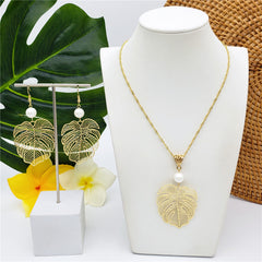 Set Of Hawaiian Monstera Leaf Earrings And Necklace Sustained With A Pearl In Different Colors