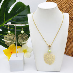 Set Of Hawaiian Monstera Leaf Earrings And Necklace Sustained With A Pearl In Different Colors