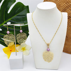 Set Of Hawaiian Monstera Leaf Earrings And Necklace Sustained With A Pearl In Different Colors