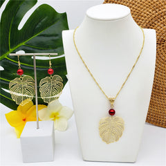 Set Of Hawaiian Monstera Leaf Earrings And Necklace Sustained With A Pearl In Different Colors