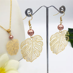 Set Of Hawaiian Monstera Leaf Earrings And Necklace Sustained With A Pearl In Different Colors