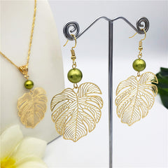 Set Of Hawaiian Monstera Leaf Earrings And Necklace Sustained With A Pearl In Different Colors