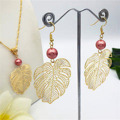 Set Of Hawaiian Monstera Leaf Earrings And Necklace Sustained With A Pearl In Different Colors